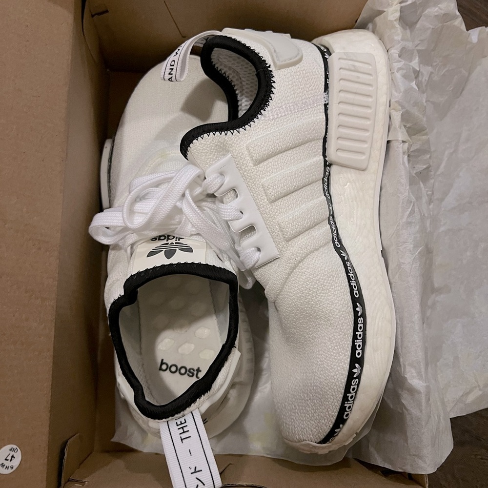 Adidas women’s shoes size 6 1/2. Brand new, just walked around house in them.